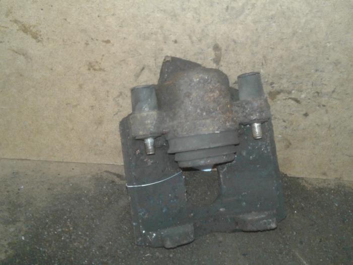 Front brake calliper, left from a Ford Fiesta 4 1.3i 2000