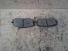 Front brake pad from a Kia Picanto (BA), 2004 / 2011 1.0 12V, Hatchback, Petrol, 999cc, 45kW (61pk), FWD, G4HE, 2004-04 / 2011-04, BAGM21; BAH51; BAM51 2005