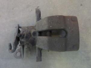 Used Rear brake calliper, left Renault Megane II (BM/CM) 1.5 dCi 80 Price on request offered by Akkie Stomphorst Autodemontage