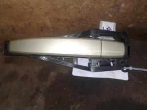 Used Rear door handle 4-door, left Opel Astra H (L48) 1.6 16V Twinport Price on request offered by Akkie Stomphorst Autodemontage