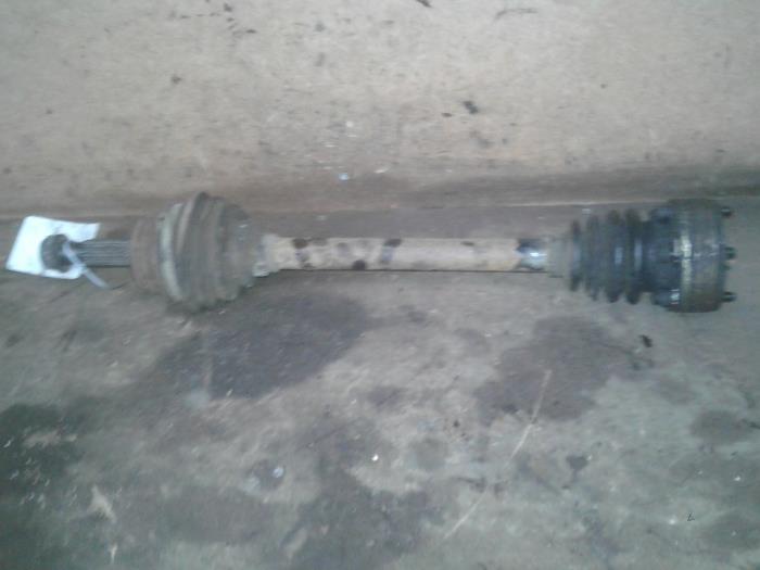Front drive shaft, left from a Volkswagen Golf II (19E) 1.3 1985