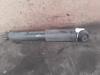 Rear shock absorber, left from a Renault Scénic I (JA), 1999 / 2003 1.6 16V, MPV, Petrol, 1.598cc, 79kW (107pk), FWD, K4M700, 1999-09 / 2003-09, JA04; JA0B; JA11 2001