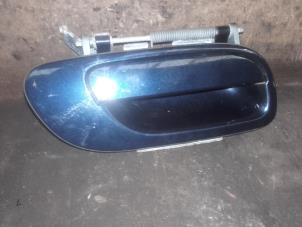 Used Rear door handle 4-door, right Volvo V70 (SW) 2.5 D Price on request offered by Akkie Stomphorst Autodemontage