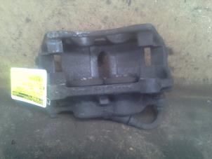 Used Front brake calliper, left Opel Vivaro 2.0 CDTI Price on request offered by Akkie Stomphorst Autodemontage