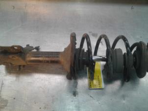 Used Front shock absorber rod, left Nissan Almera (N16) 1.5 16V Price on request offered by Akkie Stomphorst Autodemontage