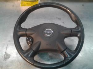Used Steering wheel Nissan Almera (N16) 1.5 16V Price on request offered by Akkie Stomphorst Autodemontage