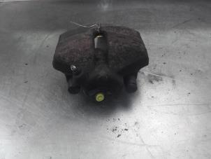 Used Front brake calliper, left Audi A3 (8P1) 2.0 TDI 16V Price on request offered by Akkie Stomphorst Autodemontage