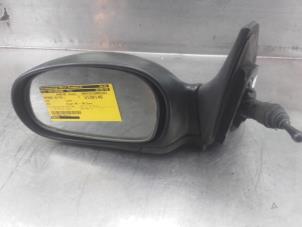 Used Wing mirror, left Kia Rio (DC22/24) 1.3 RS,LS Price on request offered by Akkie Stomphorst Autodemontage