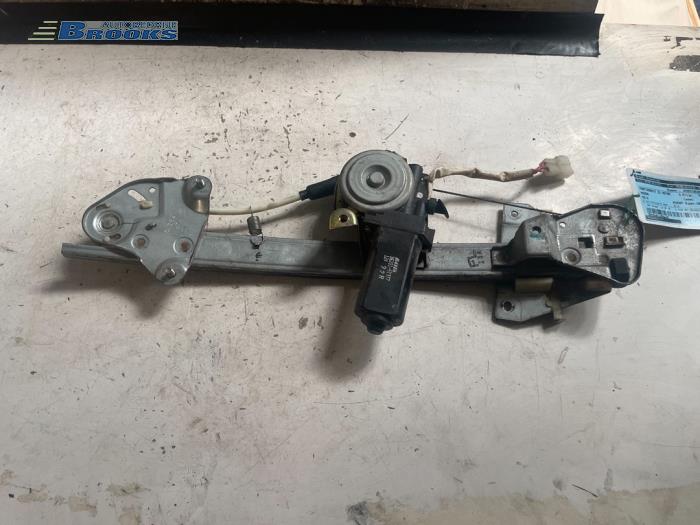 Usados Motor de ventanilla de puerta Mazda MX-3 (EC) 1.8i V6 24V Precio € 25,00 Norma de margen ofrecido por Autobedrijf Brooks