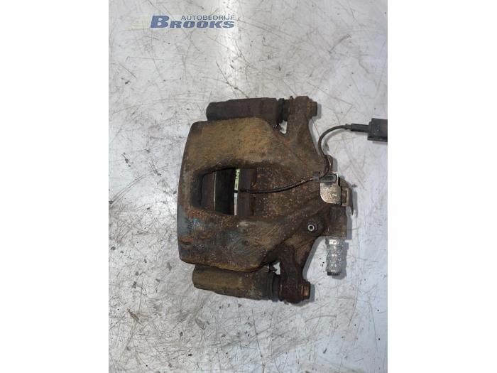 Brake caliper carrier