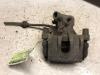 Rear brake calliper, left from a Ford C-Max (DM2), 2007 / 2010 1.6 16V, MPV, Petrol, 1.596cc, 74kW (101pk), FWD, SHDA, 2007-02 / 2010-08 2010