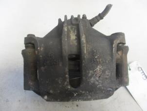 Used Front brake calliper, left Peugeot 206 (2A/C/H/J/S) 1.9 D Price € 20,00 Margin scheme offered by Autobedrijf Brooks