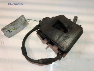 Used Front brake calliper, right Volkswagen Up! (121) 1.0 12V 75 Price € 28,00 Margin scheme offered by Autobedrijf Brooks