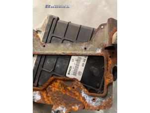 Engine management computer from a Volkswagen Caddy II (9K9A) 1.9 SDI 1996