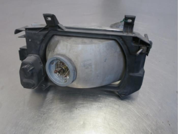 Headlight, left from a Volkswagen Transporter/Caravelle T4 1.9 TD 2002