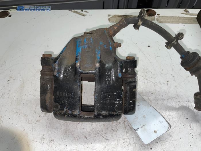Front brake calliper, left from a Fiat Punto I (176) GT 1.4 Turbo 1994