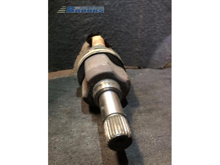 Front drive shaft, left from a Peugeot Partner 1.6 HDI 75 2007