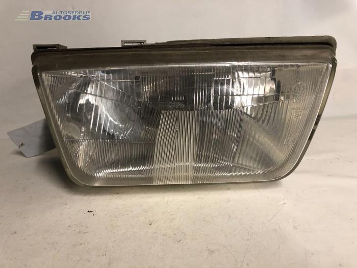 Headlight, left from a Renault Express/Rapid/Extra 1.9 D 1992