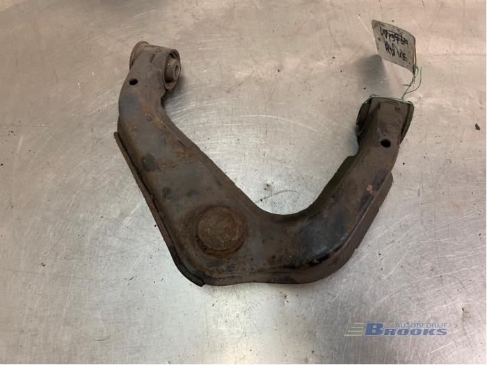 Front upper wishbone, right from a Nissan Navara (D40) 2.5 dCi 16V 4x4 2006