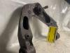 Front upper wishbone, left from a Nissan Navara (D40) 2.5 dCi 16V 4x4 2006
