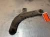 Front wishbone, left from a Nissan NV 200 (M20M), 2010 1.5 dCi 90, Delivery, Diesel, 1.461cc, 66kW (90pk), FWD, K9K892; EURO4, 2011-04 2014
