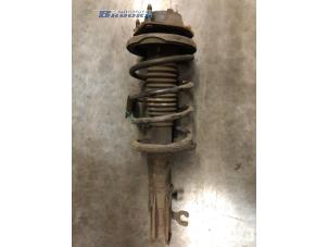 Used Front shock absorber rod, right Mazda 323 Price € 15,00 Margin scheme offered by Autobedrijf Brooks