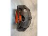 Front brake calliper, right from a Renault Clio III (BR/CR) 1.5 dCi 85 2007