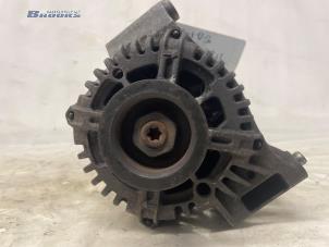 Dynamo van een Fiat Fiorino (225) 1.3 JTD 16V Multijet 2010