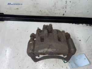 Used Front brake calliper, left Hyundai H-1/Starex Travel 2.5 TD Price € 10,00 Margin scheme offered by Autobedrijf Brooks