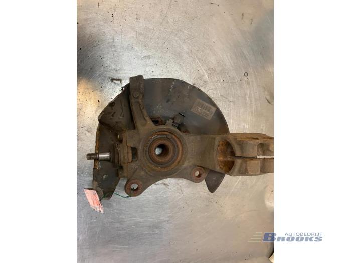 Knuckle, front left from a Volkswagen Multivan T5 (7E/7HC/7HF/7HM) 2.5 Tdi 2004
