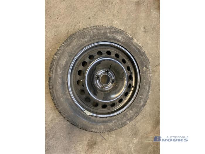 Wheel + tyre from a Renault Megane II CC (EM) 2.0 16V 2004