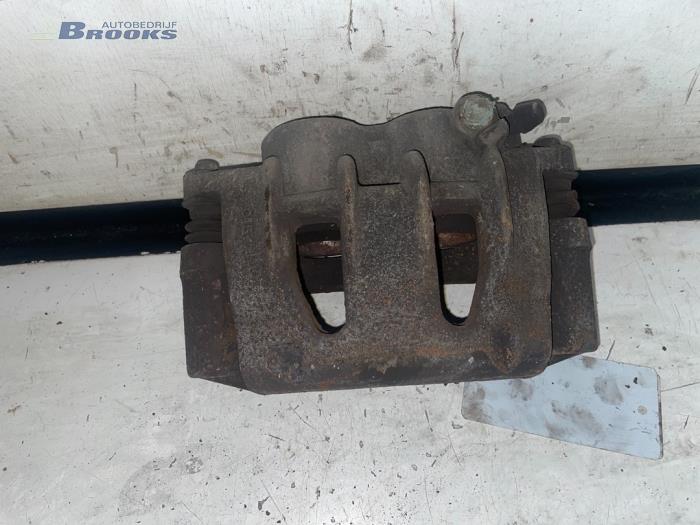 Front brake calliper, left from a Ford Transit 2.0 TDdi 16V 260S 2002