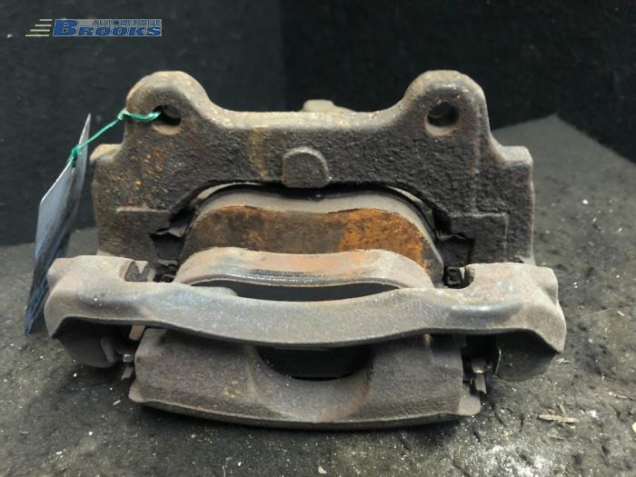 Front brake calliper, left from a Fiat Punto Evo (199) 1.3 JTD Multijet 85 16V 2010