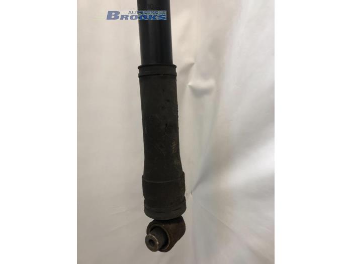 Rear shock absorber, left from a Renault Megane III Grandtour (KZ) 1.5 dCi 90 2011
