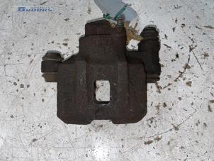 Used Front brake calliper, left Daihatsu Charade (G100/101/102/112) 1.0 TS,CS Special Price € 10,00 Margin scheme offered by Autobedrijf Brooks