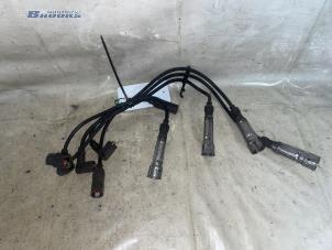 Usados Juego de cables de bujías Volkswagen Polo II (86) 1.3 Precio € 15,00 Norma de margen ofrecido por Autobedrijf Brooks