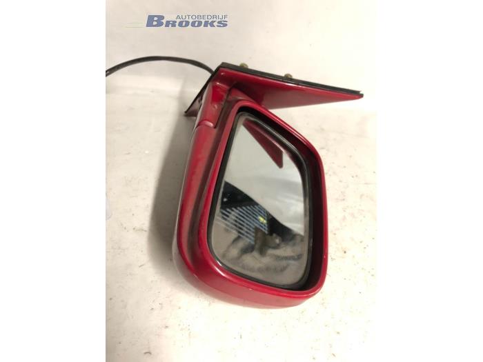 Wing mirror, right from a Daihatsu Applause I 1.6 16V 1996