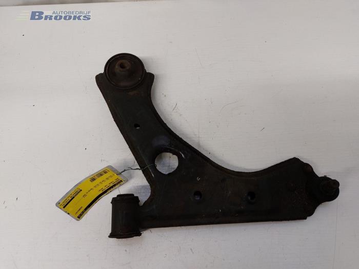Front wishbone, left from a Opel Corsa D 1.4 16V Twinport 2010