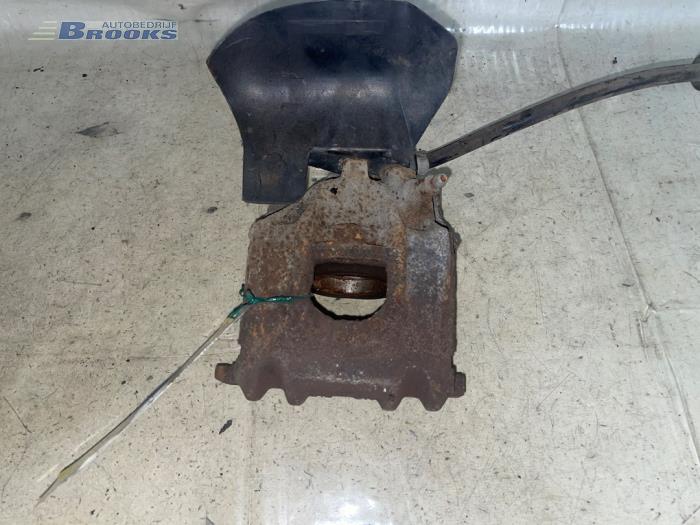 Front brake calliper, left from a Seat Arosa (6H1) 1.0 MPi 1999