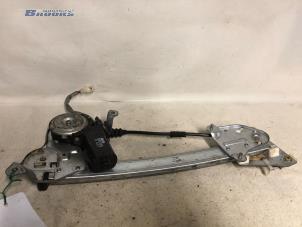Usados Motor de ventanilla de puerta Mazda 626 Precio € 25,00 Norma de margen ofrecido por Autobedrijf Brooks