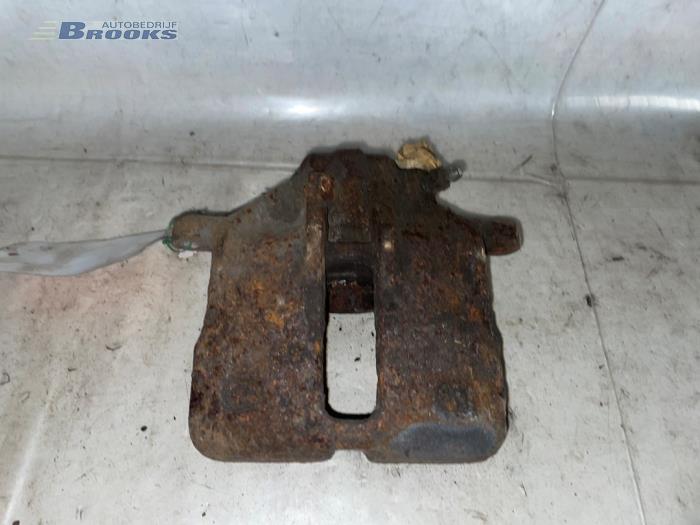 Front brake calliper, left from a Volkswagen Golf III (1H1) 2.0 GTI 16V 1994