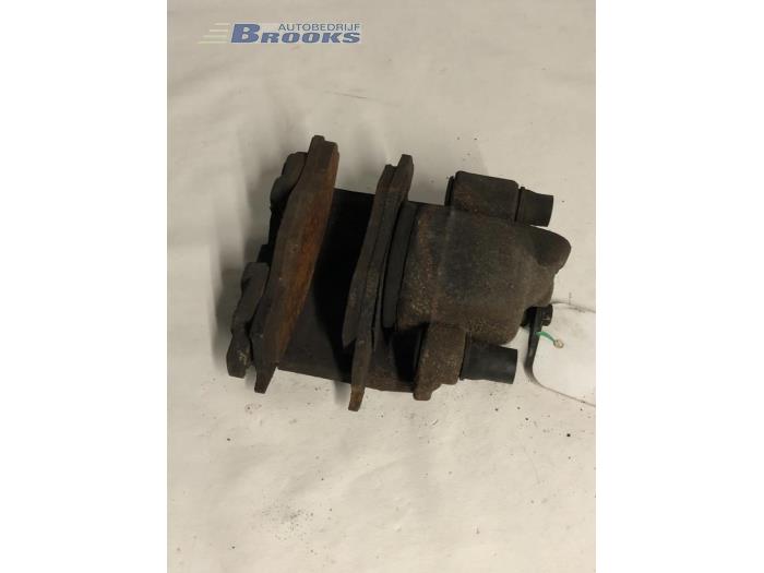 Usagé Etrier de frein avant gauche Volkswagen Golf III (1H1) 1.4 CL Prix € 10,00 Règlement à la marge proposé par Autobedrijf Brooks