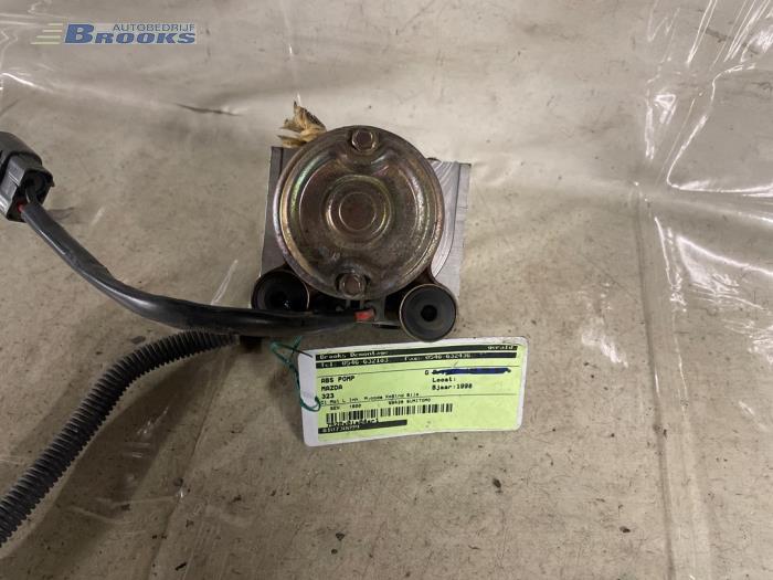 Używane Pompa ABS Mazda 323 Cena € 50,00 Procedura marży oferowane przez Autobedrijf Brooks