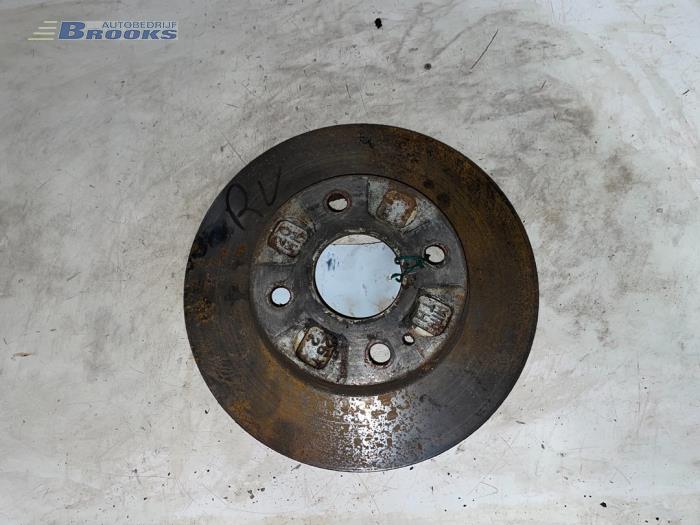 Front brake disc from a Mazda 323 Fastbreak (BJ14) 1.5 LX,GLX 16V 1999