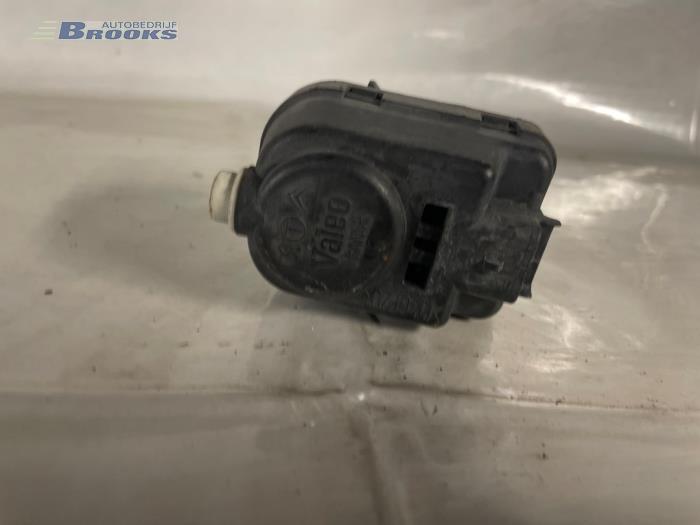 Headlight motor from a Peugeot 306 Break (7E) 1.9 D 1999