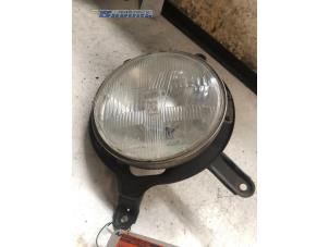 Used Headlight, left Nissan Patrol GR (Y60) 2.8 GR TD Price on request offered by Autobedrijf Brooks