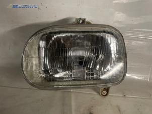 Used Headlight, left Daihatsu Cuore (L251/271/276) 850,Domino Price € 10,00 Margin scheme offered by Autobedrijf Brooks