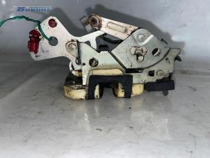 Used Rear door lock mechanism 4-door, left Kia Sephia (FA/FB22) 1.6i Price € 10,00 Margin scheme offered by Autobedrijf Brooks