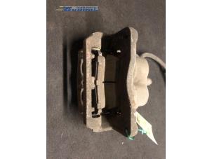 Used Front brake calliper, right Subaru Legacy Wagon (BH) 2.0 16V Price € 10,00 Margin scheme offered by Autobedrijf Brooks