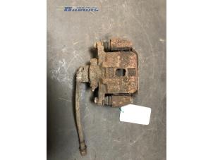 Used Rear brake calliper, left Subaru Legacy Wagon (BH) 2.0 16V Price € 20,00 Margin scheme offered by Autobedrijf Brooks